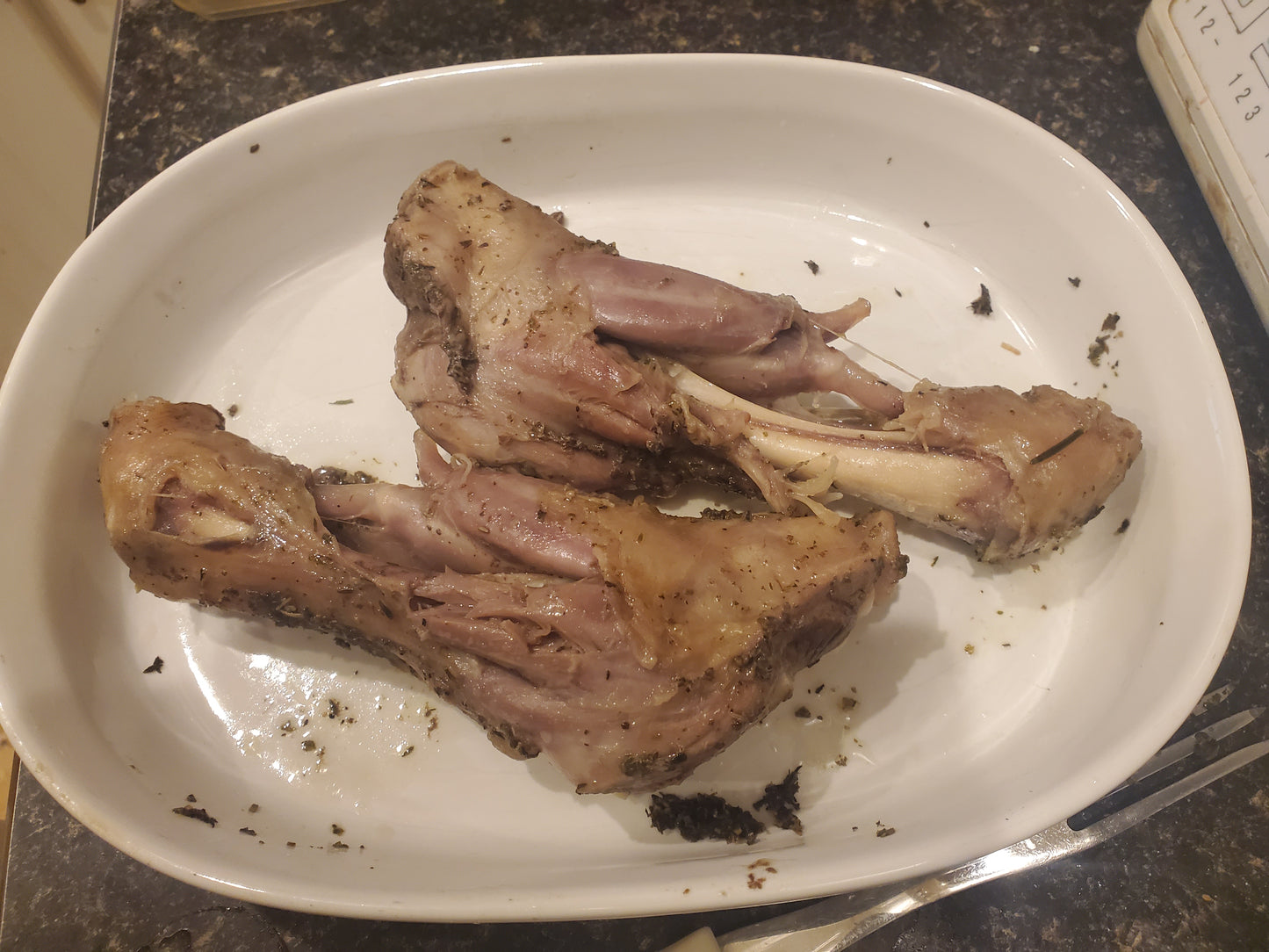 two slow roasted lamb shanks from a local alberta farm